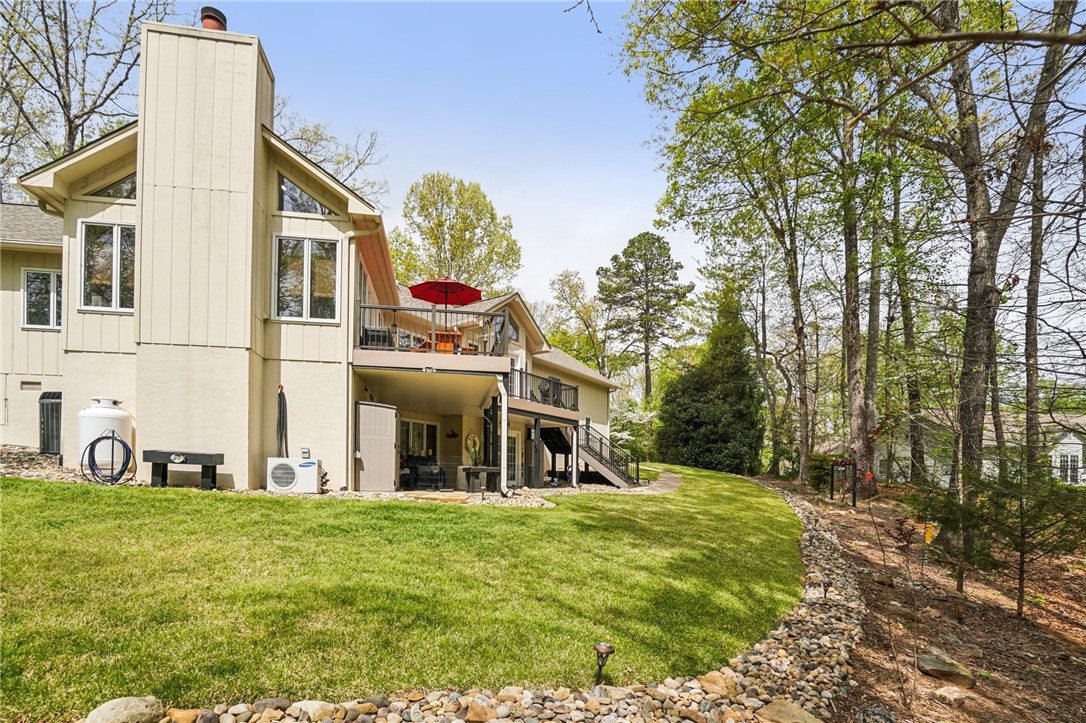120 Beacon Ridge Circle Salem, SC 29676 - Photo 44 of 49 This residence features a multi-level deck overlooking a spacious yard surrounded by mature trees.