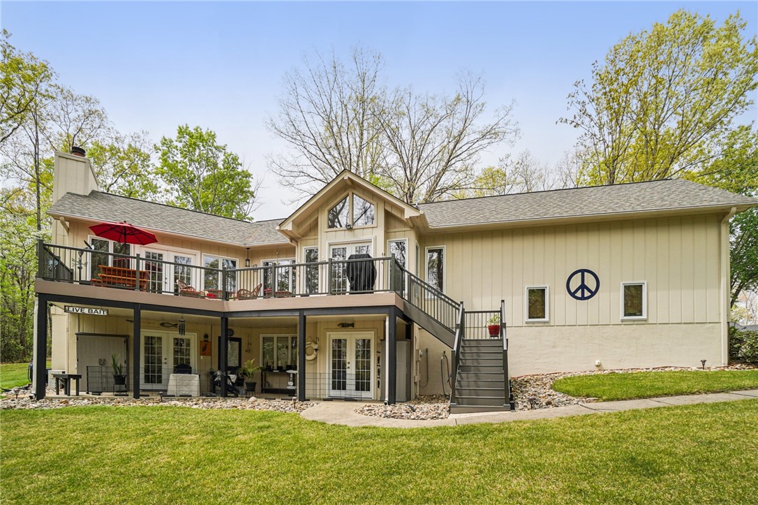 120 Beacon Ridge Circle Salem, SC 29676 - Photo 45 of 49 This spacious two-story residence features an expansive deck and multiple outdoor access points for seamless living.