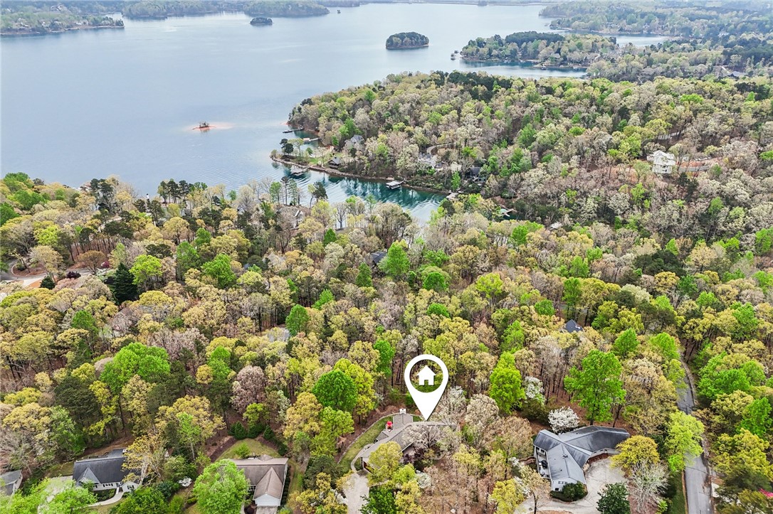 120 Beacon Ridge Circle Salem, SC 29676 - Photo 47 of 49 Perched among lush trees, this property offers serene waterfront access and picturesque views.