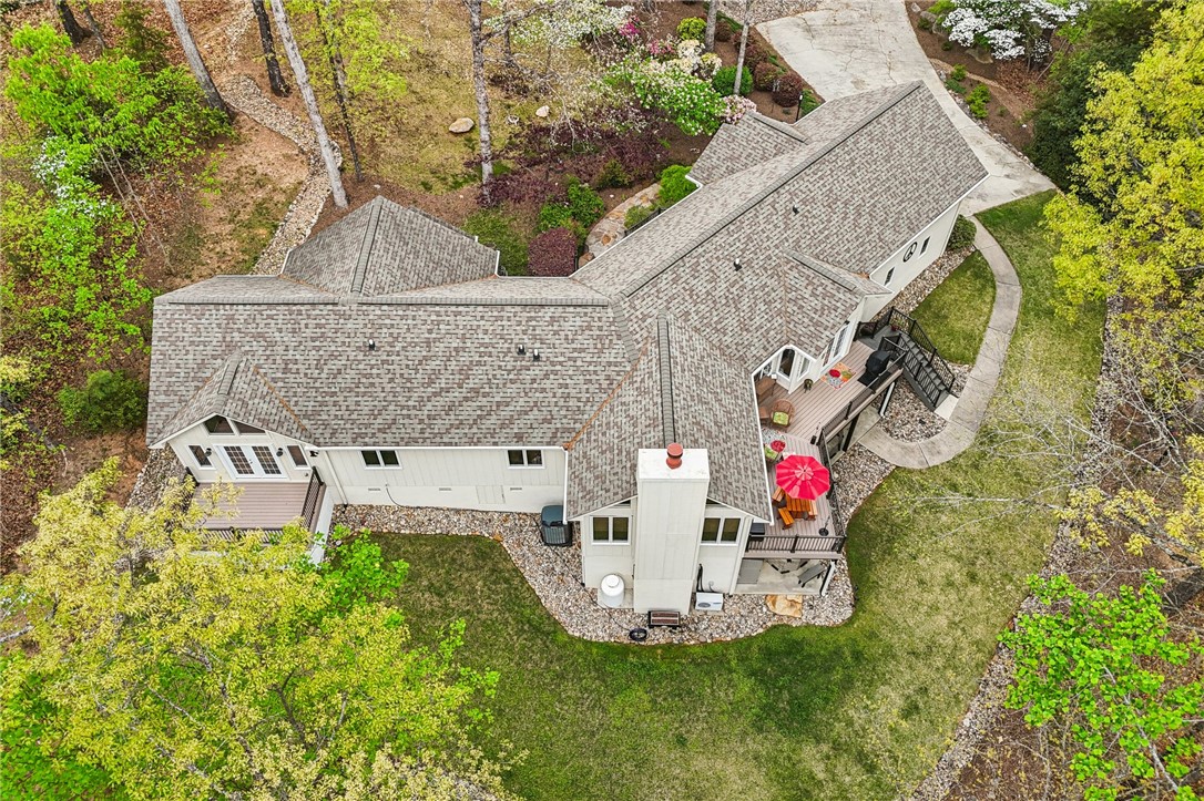 120 Beacon Ridge Circle Salem, SC 29676 - Photo 48 of 49 An aerial view showcases the expansive property with multiple outdoor living spaces, blending with the natural surroundings.