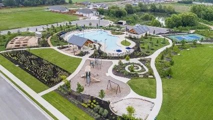 an aerial view of a house with outdoor space