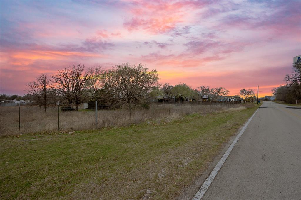 7702 Mansfield Cardinal Road Arlington, TX 76060 - Photo 1 of 1 View of road