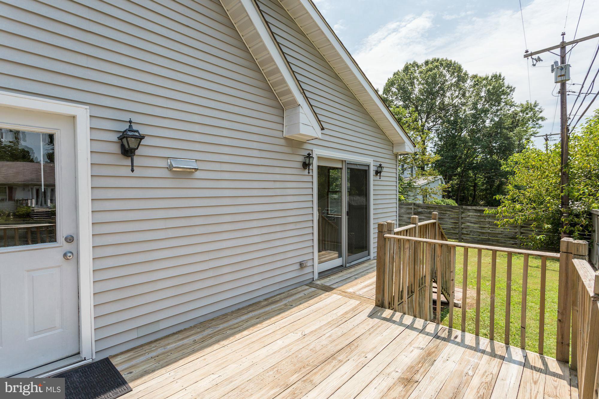 1201 Steamboat Road Shady Side, MD 20764 - Photo 19 of 27 side deck off Kitchen and Family Room