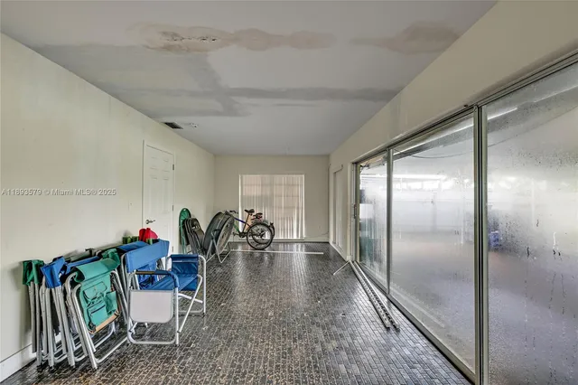 a very nice looking dining room with a table and chairs