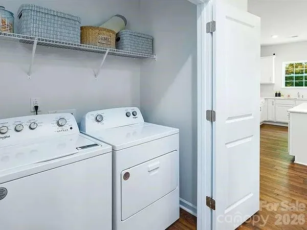 a utility room with dryer and washer