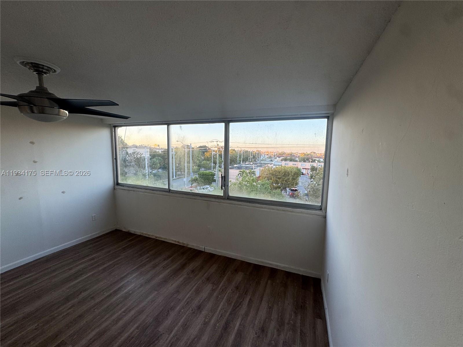1750 West 56th Street, Unit 211 Hialeah, FL 33012 - Photo 15 of 19 an empty room with a window