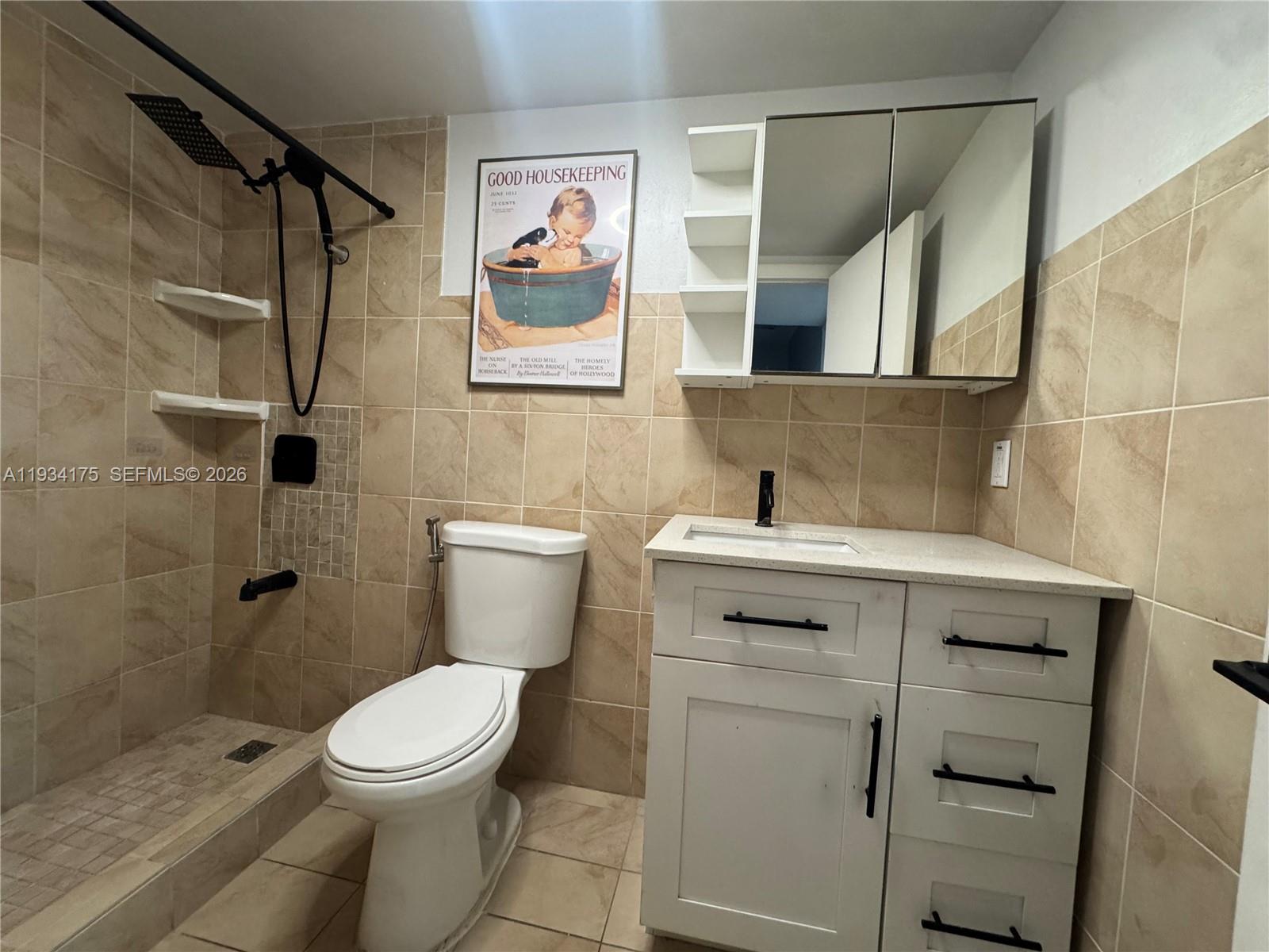 1750 West 56th Street, Unit 211 Hialeah, FL 33012 - Photo 16 of 19 a bathroom with a sink a toilet and shower