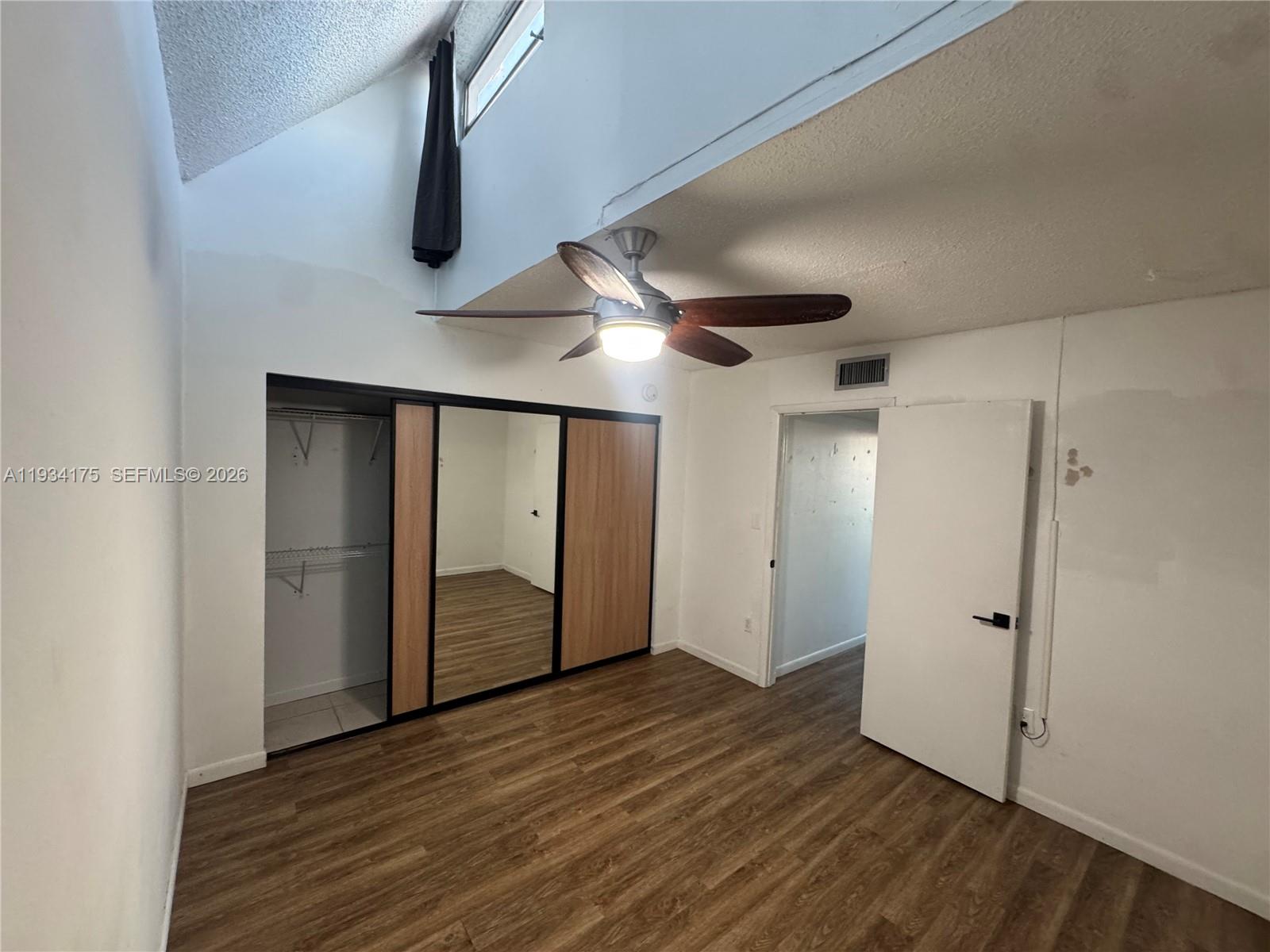 1750 West 56th Street, Unit 211 Hialeah, FL 33012 - Photo 18 of 19 a view of an empty room