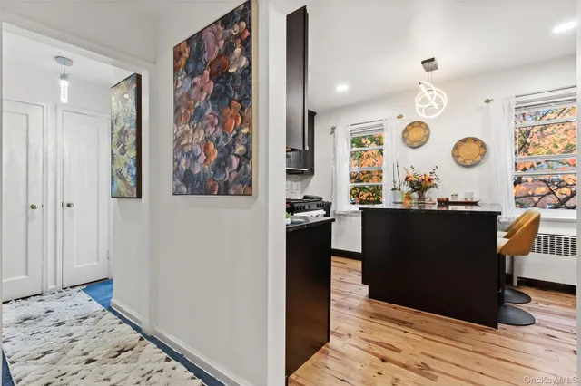 a room with painting and a table