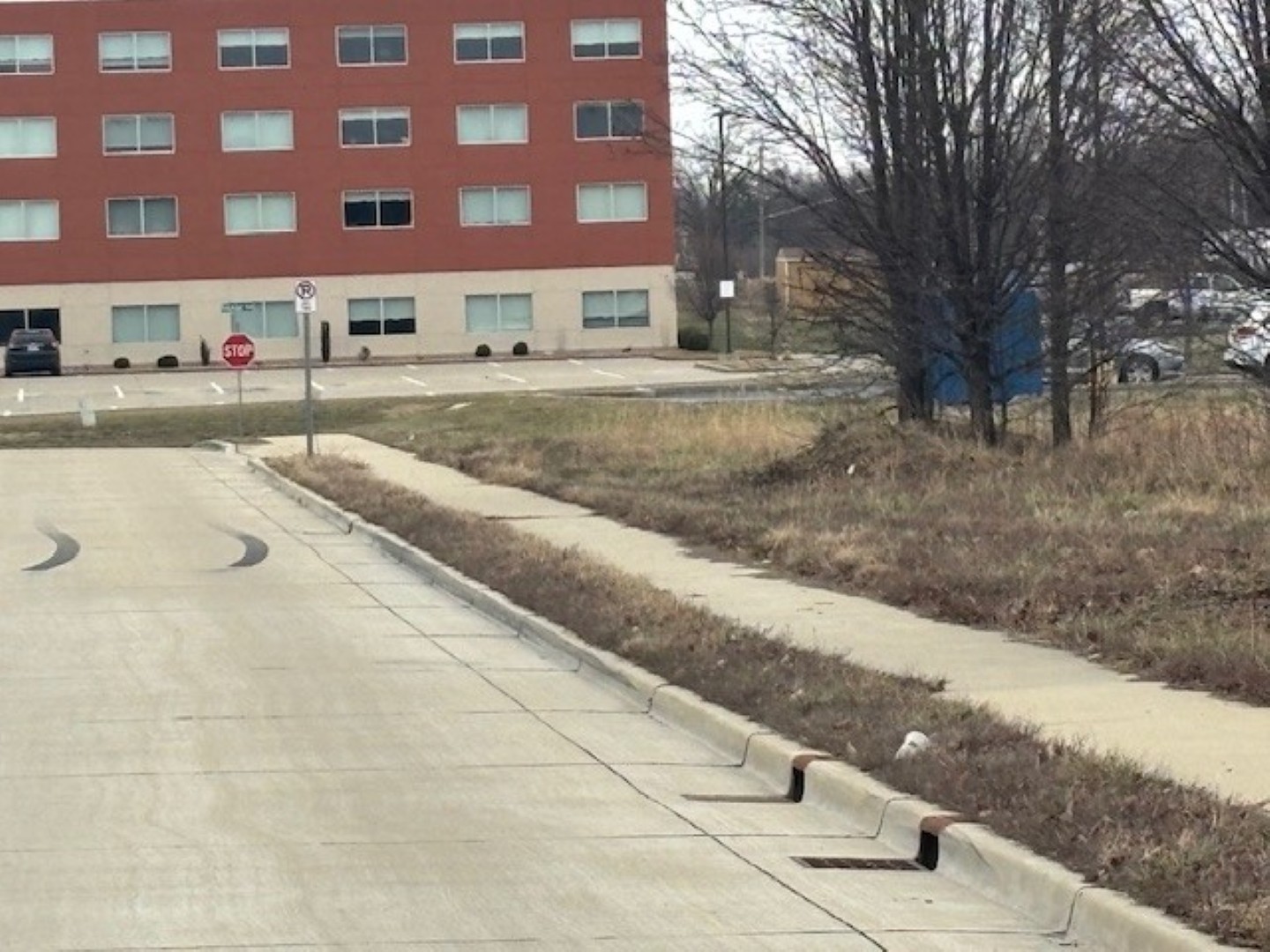 Tbd Progress Drive Mount Vernon, IL 62864 - Photo 8 of 10 a view of a brick building next to a road