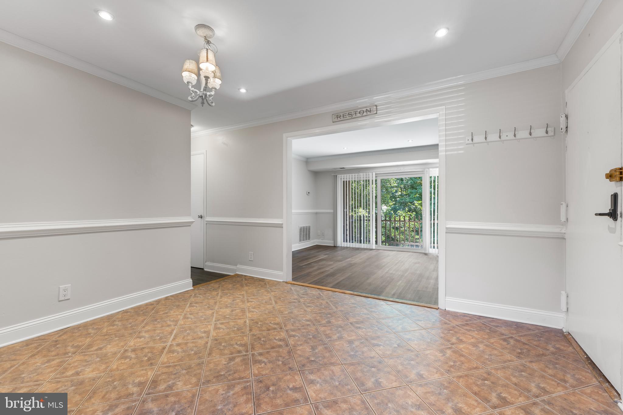 11611 Vantage Hill Road, Unit 11B Reston, VA 20190 - Photo 13 of 26 Chair rail and fresh paint throughout.
