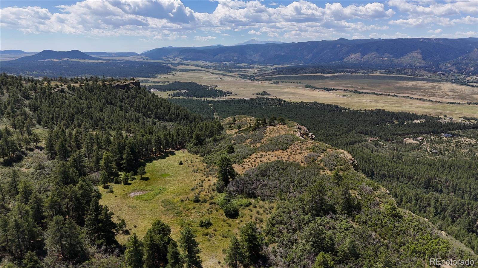 5080 South Perry Park Road Sedalia, CO 80135 - Photo 16 of 39 a view of lake with mountain