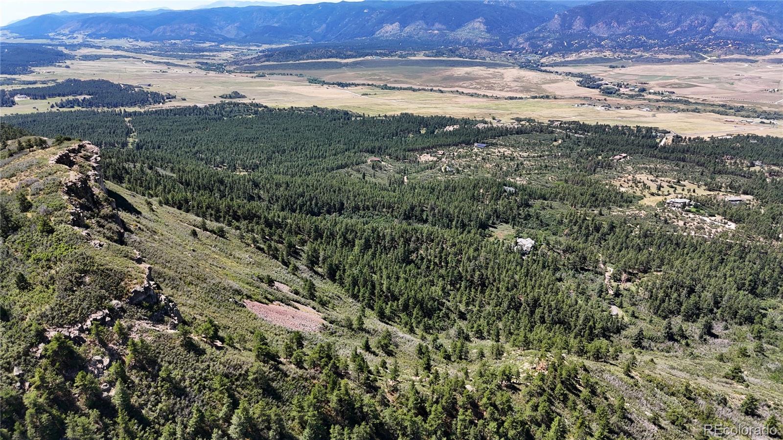 5080 South Perry Park Road Sedalia, CO 80135 - Photo 18 of 39 a view of an ocean and a mountain