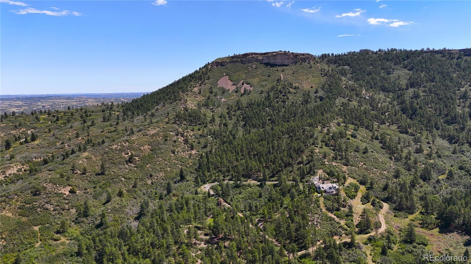 5080 South Perry Park Road Sedalia, CO 80135 - Photo 38 of 39 a view of a mountain