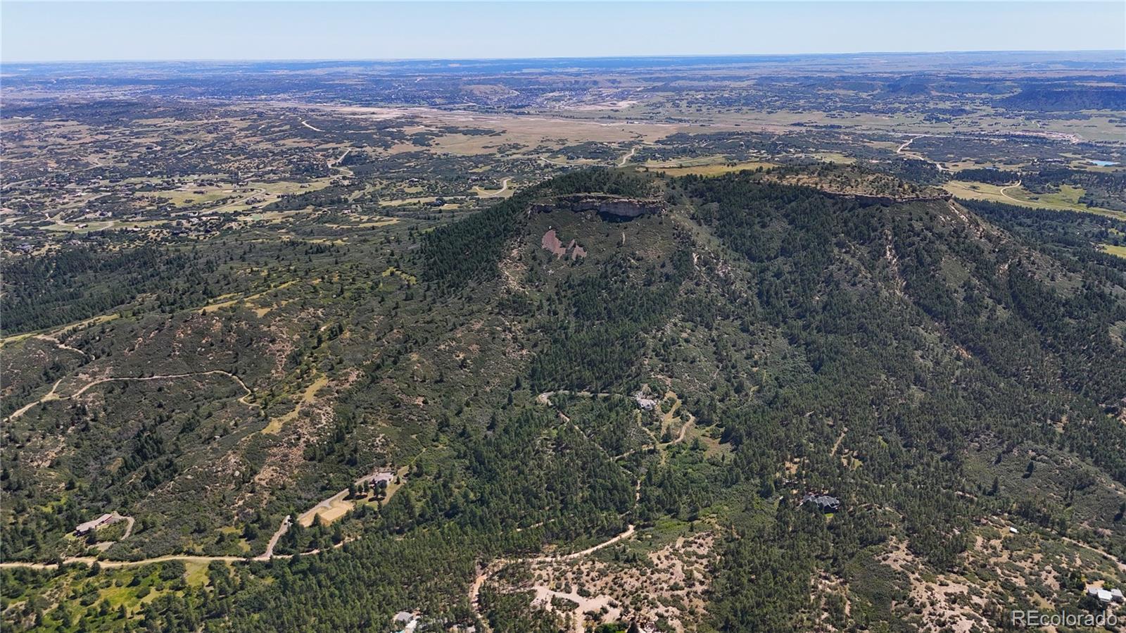 5080 South Perry Park Road Sedalia, CO 80135 - Photo 10 of 39 a view of city and mountain