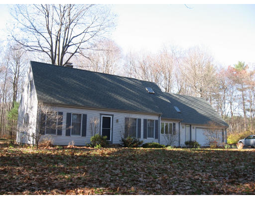 58 Gilbert Road Southampton, MA 01073 - Photo 1 of 13 a front view of a house with a yard