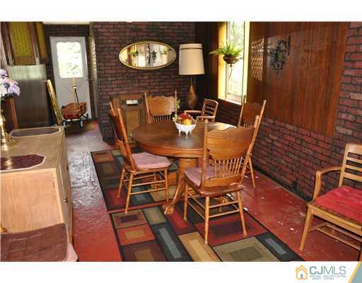 27 Colton Road Edison, NJ 08817 - Photo 5 of 9 a dining room with furniture and window