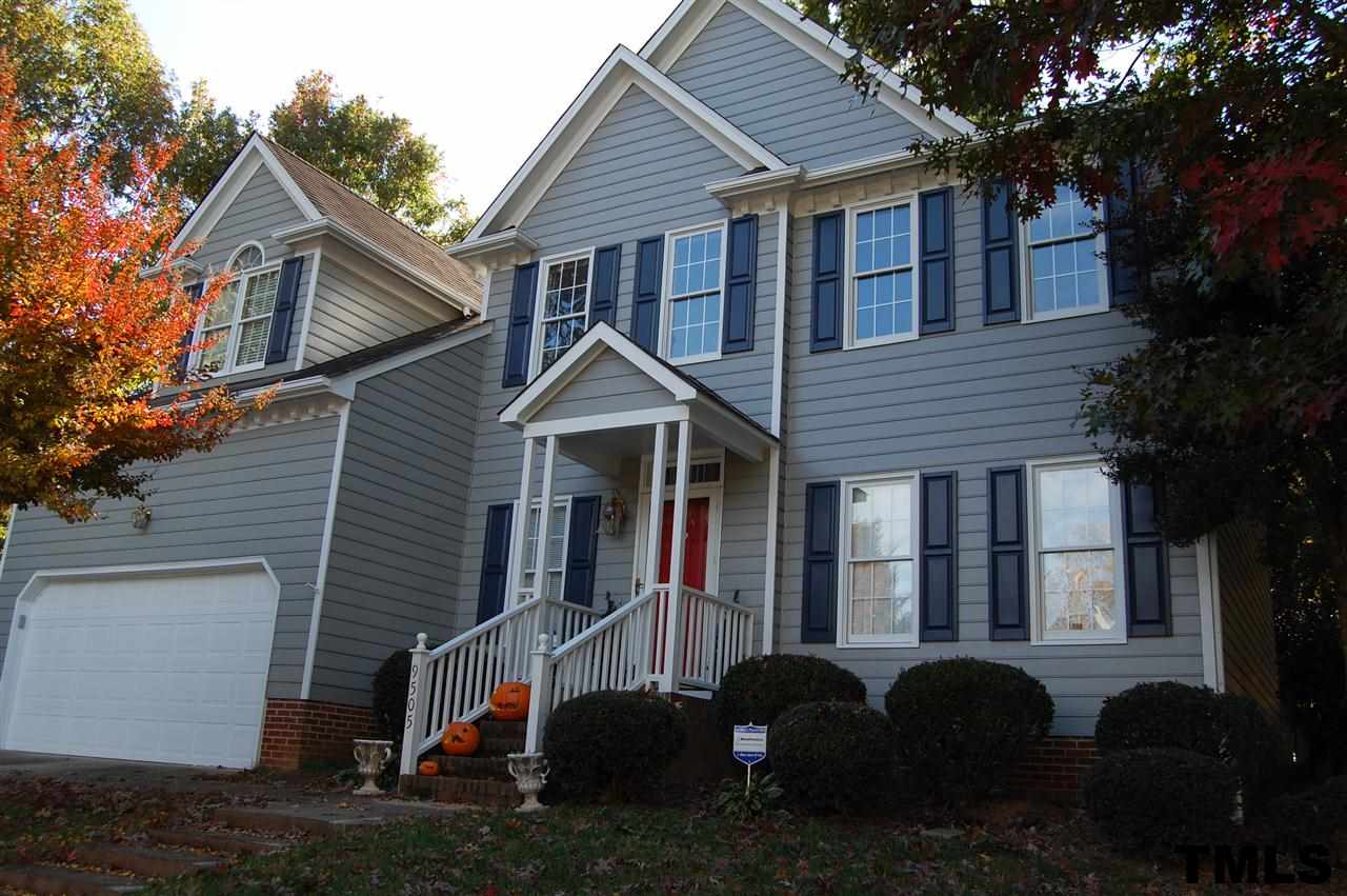9505 Meadowmont Lane Raleigh, NC 27615 - Photo 1 of 18 a view of a house with a yard