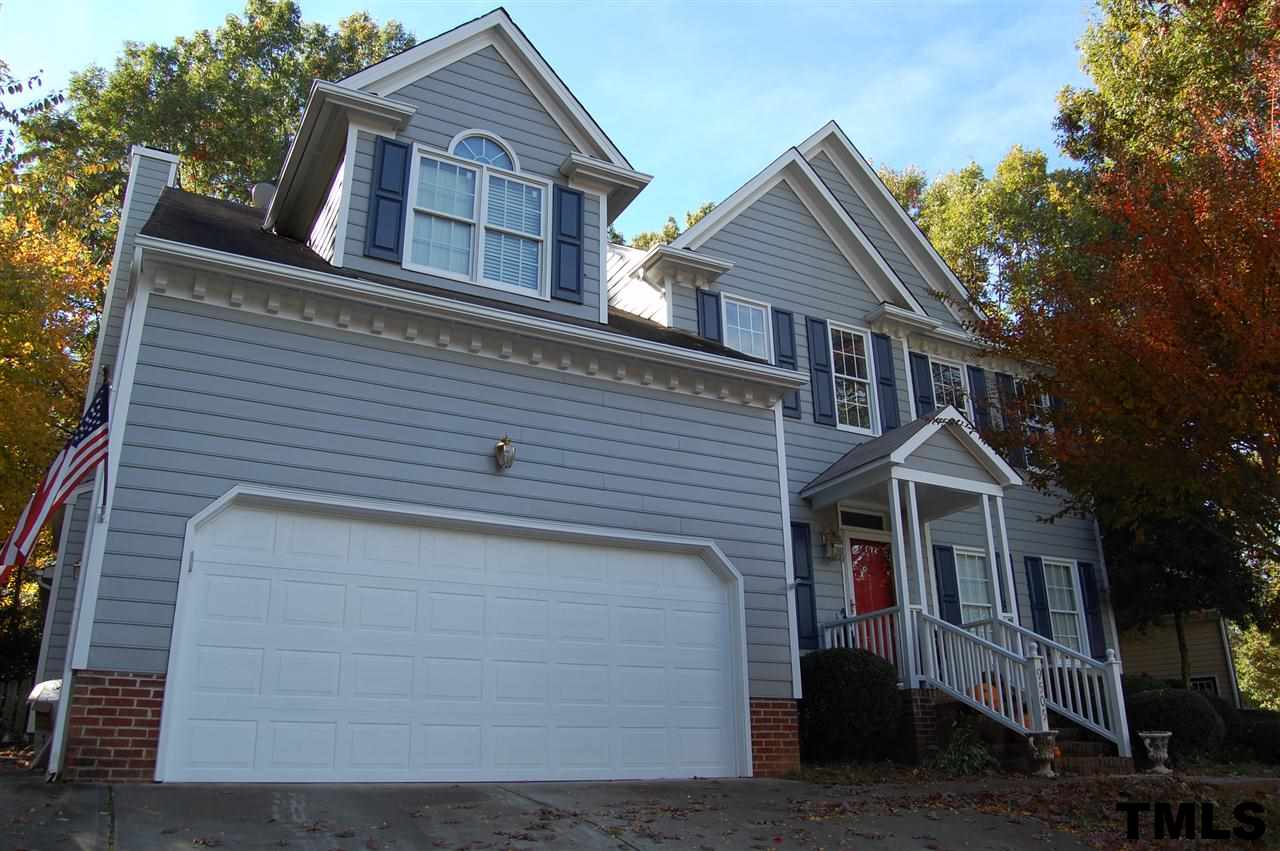 9505 Meadowmont Lane Raleigh, NC 27615 - Photo 3 of 18 a view of house that has tree in front of it