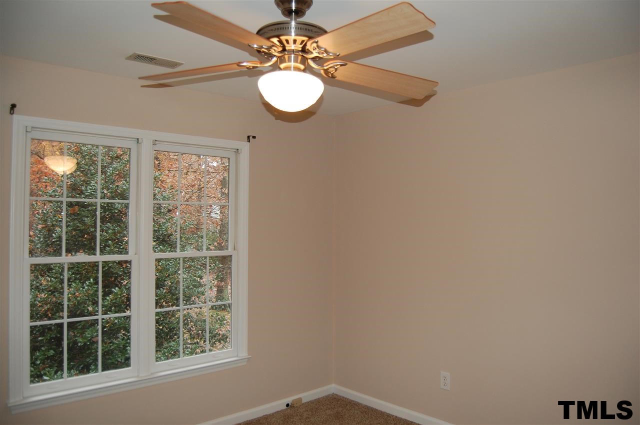 9505 Meadowmont Lane Raleigh, NC 27615 - Photo 6 of 18 a view of a livingroom with furniture and window