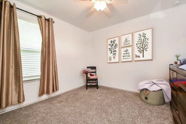 a view of a livingroom with furniture