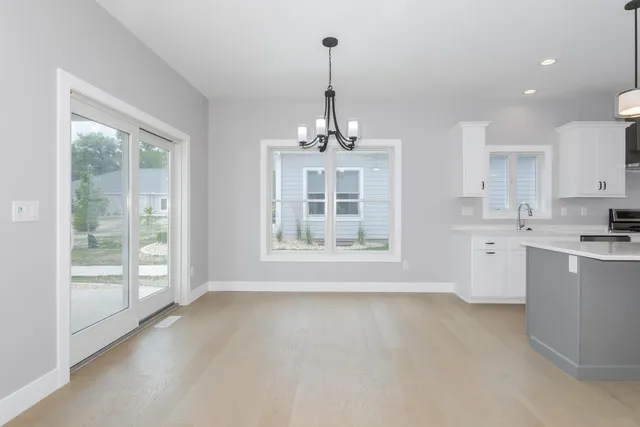 an empty room with fan and a ceiling fan