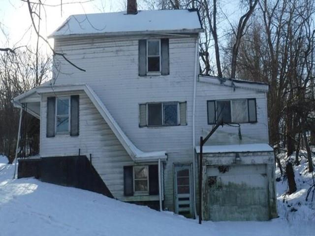 7 Short Avenue Washington, PA 15301 - Photo 2 of 10 a front view of a house with garage
