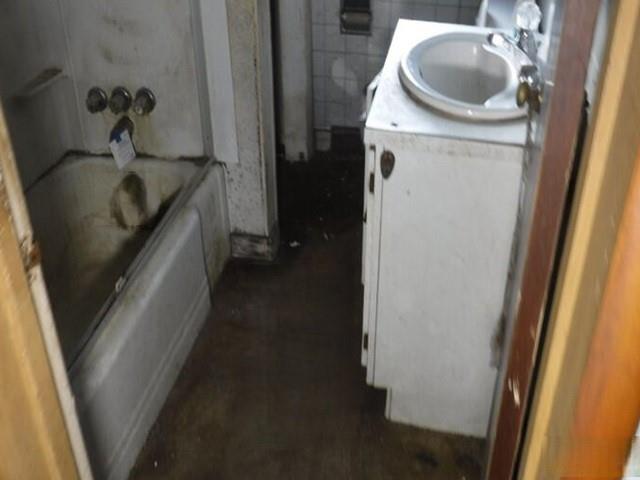 7 Short Avenue Washington, PA 15301 - Photo 10 of 10 a bathroom with a sink and a tub