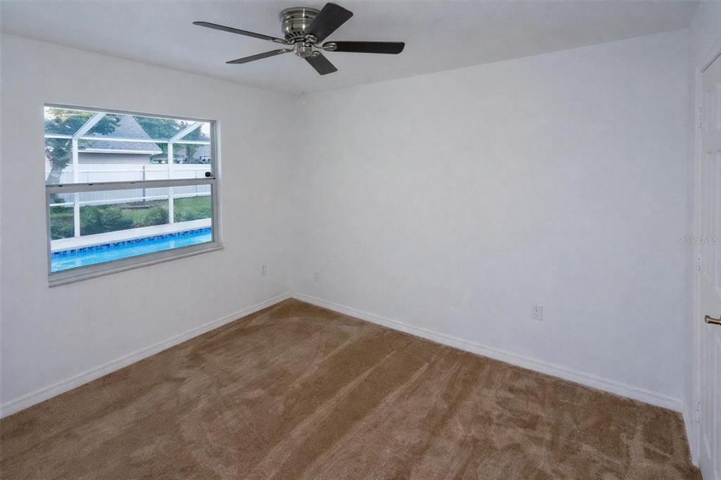 8276 Short Way Lakeland, FL 33809 - Photo 3 of 12 an empty room with a window