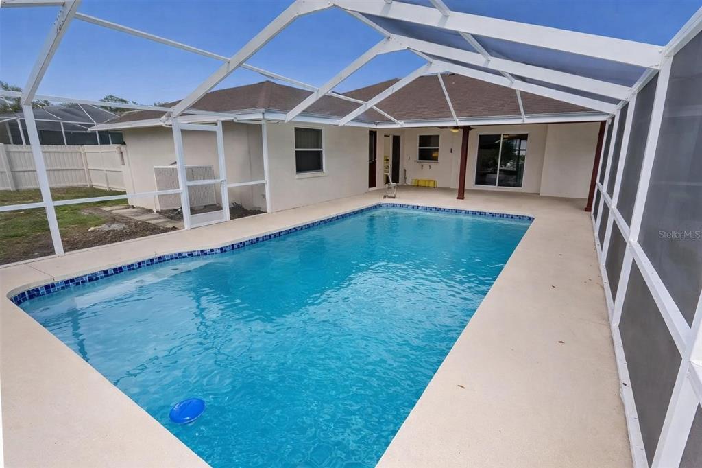 8276 Short Way Lakeland, FL 33809 - Photo 6 of 12 a view of a house with swimming pool