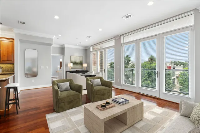 a living room with furniture and a table