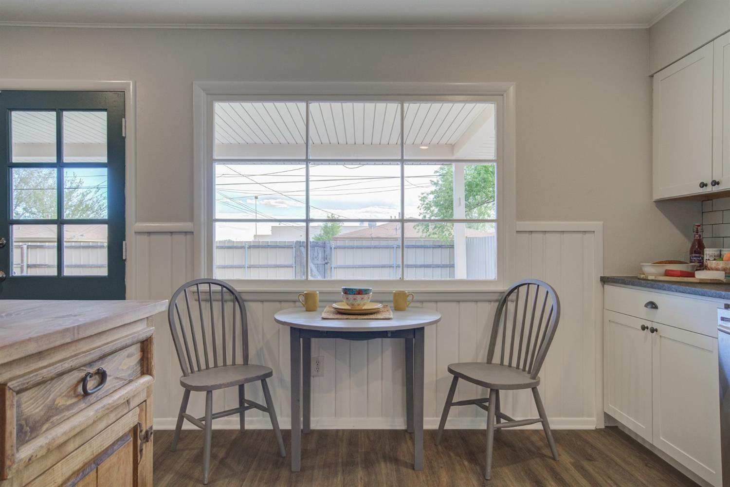 2311 61st Street Lubbock, TX 79412 - Photo 17 of 32 a dining room with furniture and window