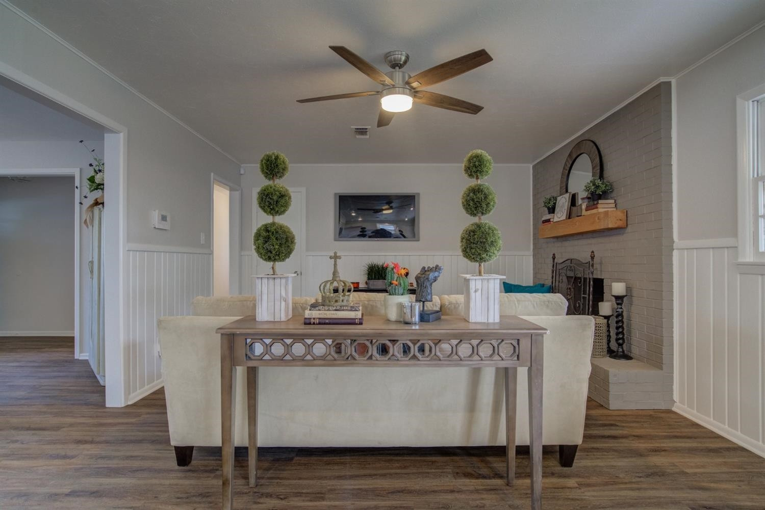 2311 61st Street Lubbock, TX 79412 - Photo 20 of 32 a living room with furniture and wooden floor