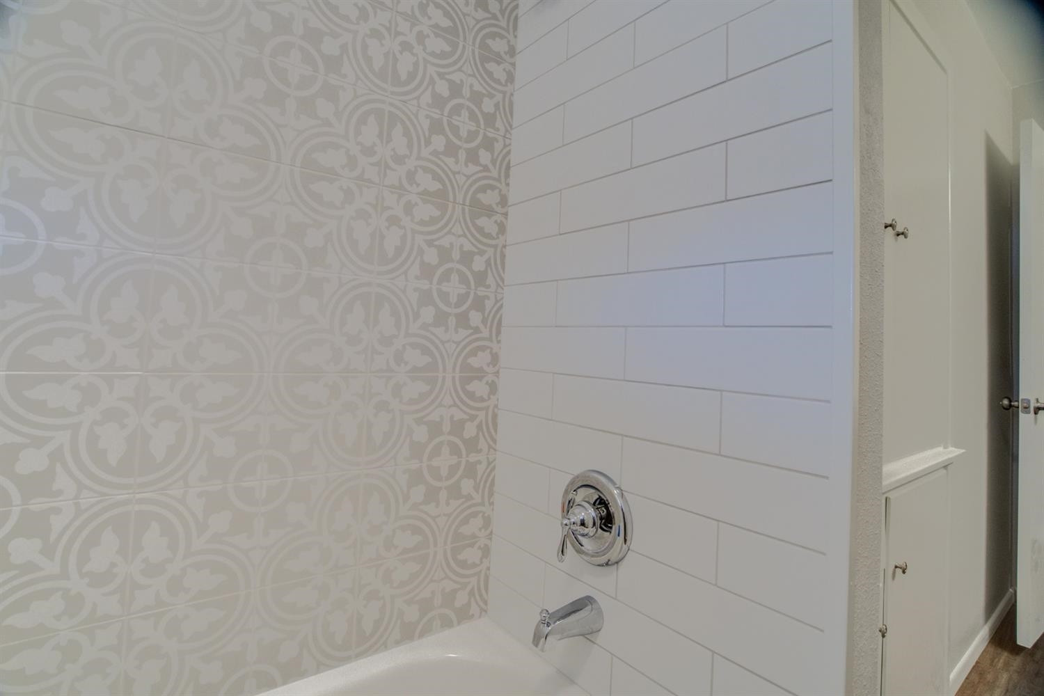 2311 61st Street Lubbock, TX 79412 - Photo 30 of 32 a bathroom with a shower