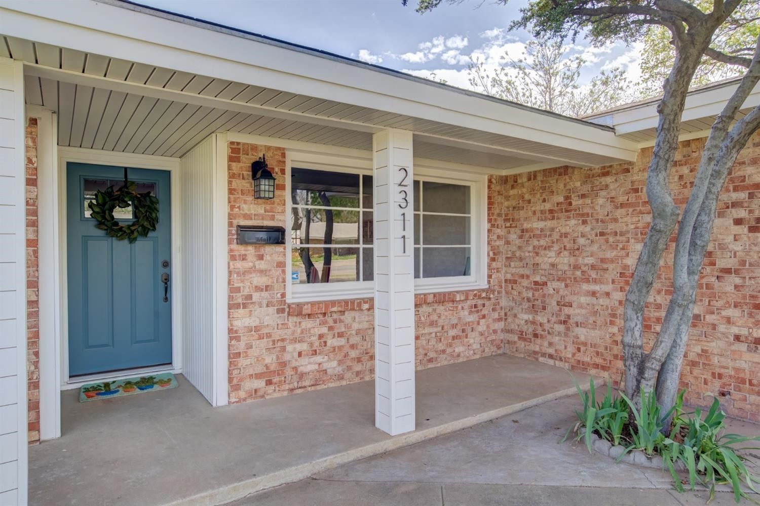 2311 61st Street Lubbock, TX 79412 - Photo 3 of 32 a front view of a house