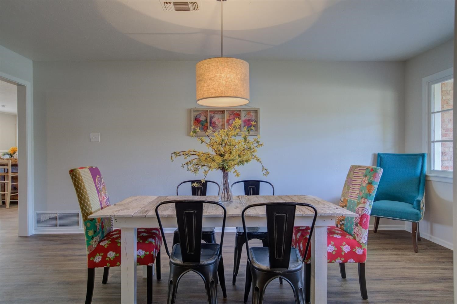 2311 61st Street Lubbock, TX 79412 - Photo 6 of 32 a dining room with furniture and wooden floor
