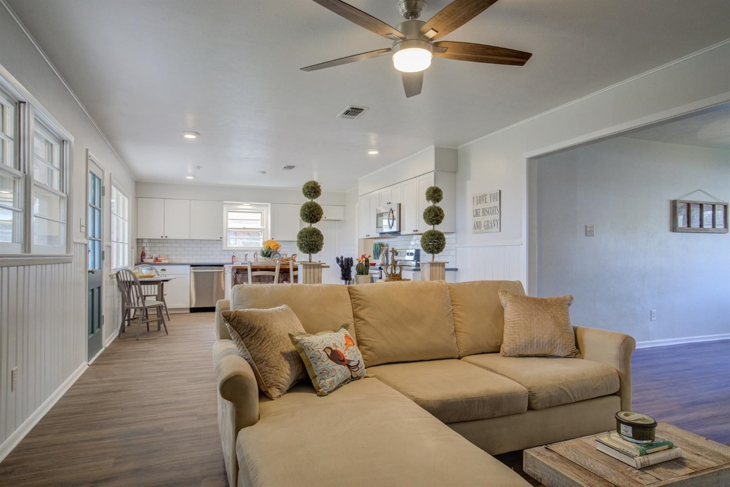 2311 61st Street Lubbock, TX 79412 - Photo 9 of 32 a living room with furniture and a large window