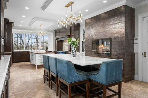 a kitchen with stainless steel appliances granite countertop a stove and cabinets