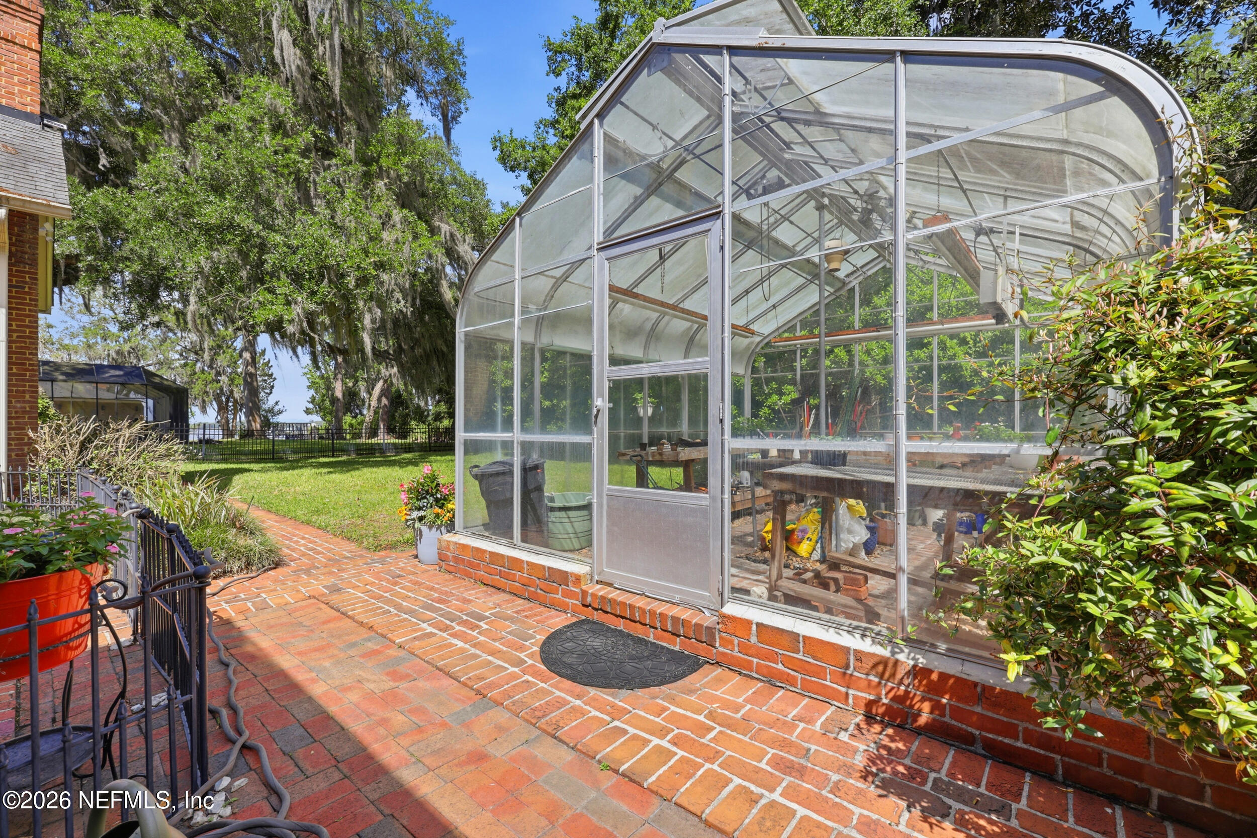 13200 Mandarin Road Jacksonville, FL 32223 - Photo 101 of 173 a view of a house with backyard and sitting area