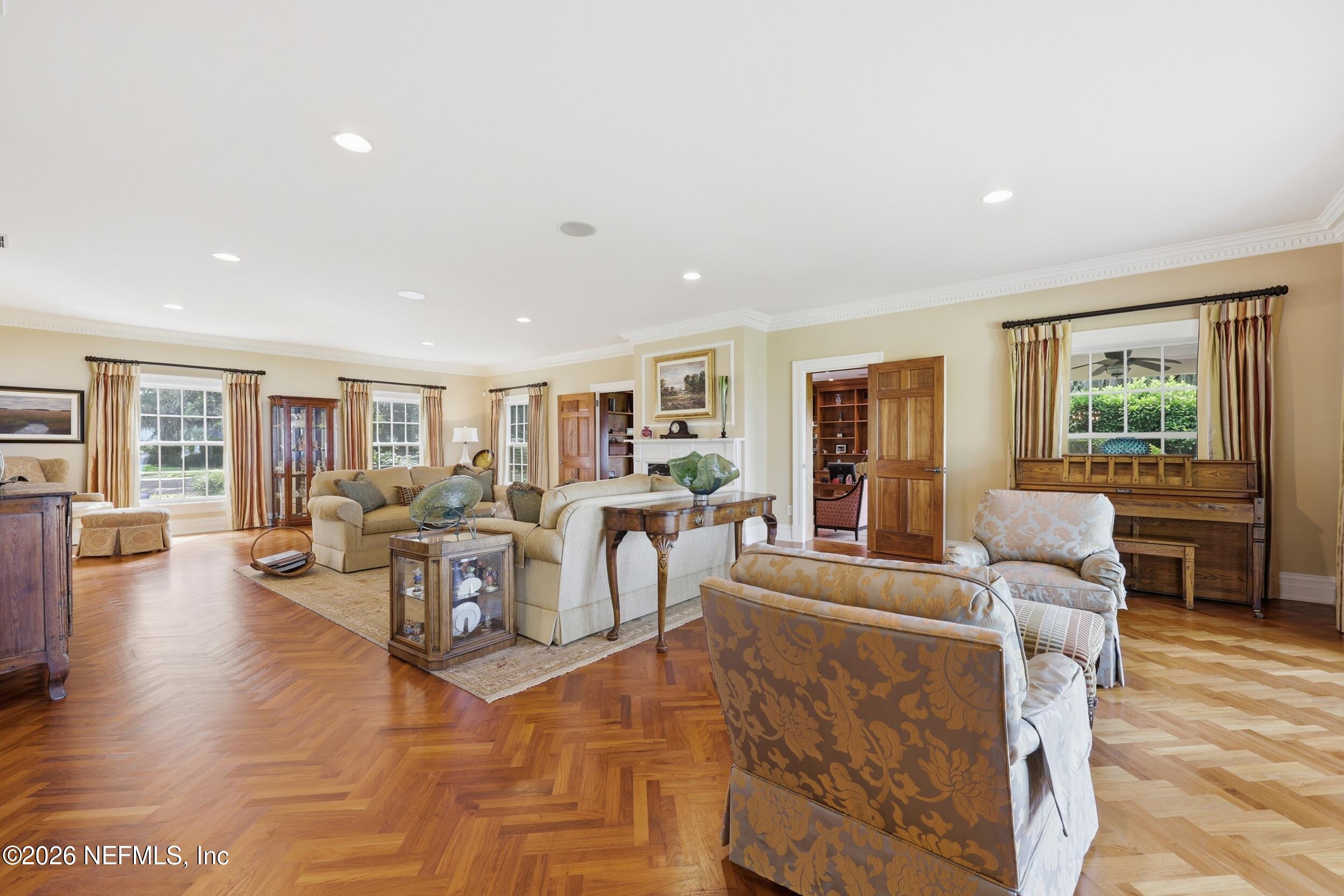 13200 Mandarin Road Jacksonville, FL 32223 - Photo 113 of 173 a living room with fireplace furniture and a wooden floor