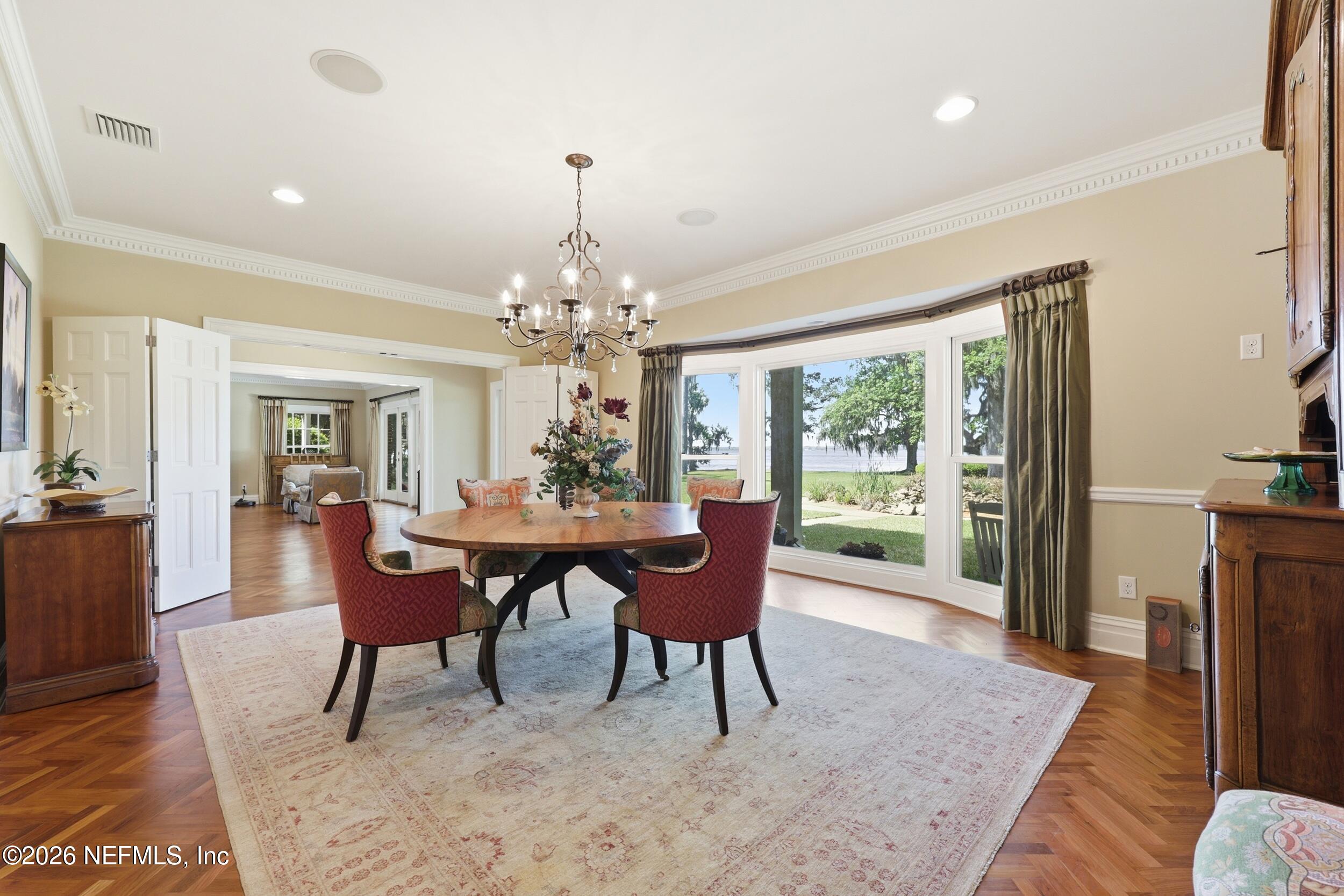 13200 Mandarin Road Jacksonville, FL 32223 - Photo 114 of 173 a view of a dining room with furniture window and wooden floor