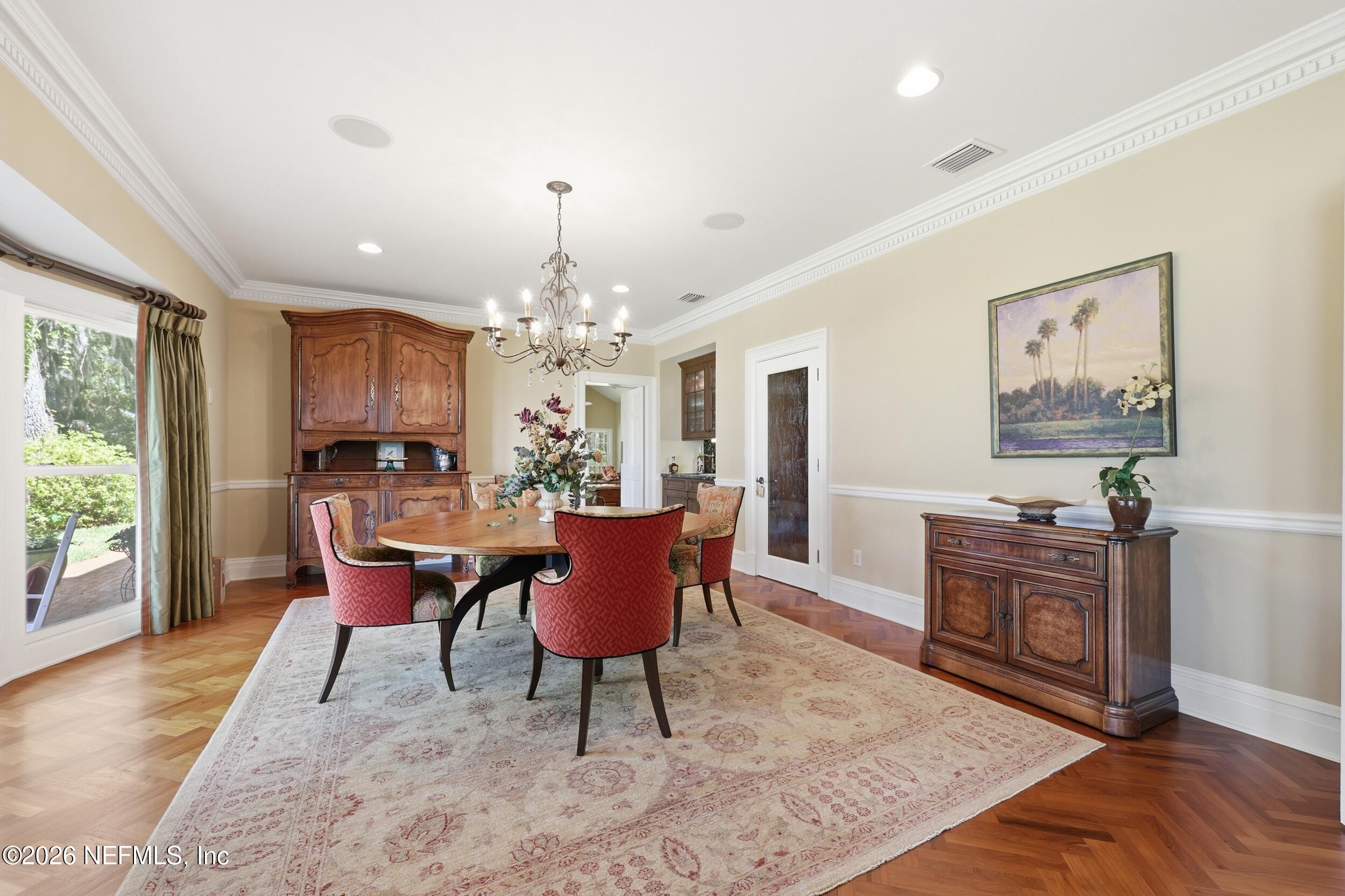 13200 Mandarin Road Jacksonville, FL 32223 - Photo 115 of 173 a view of a dining room with furniture window and wooden floor