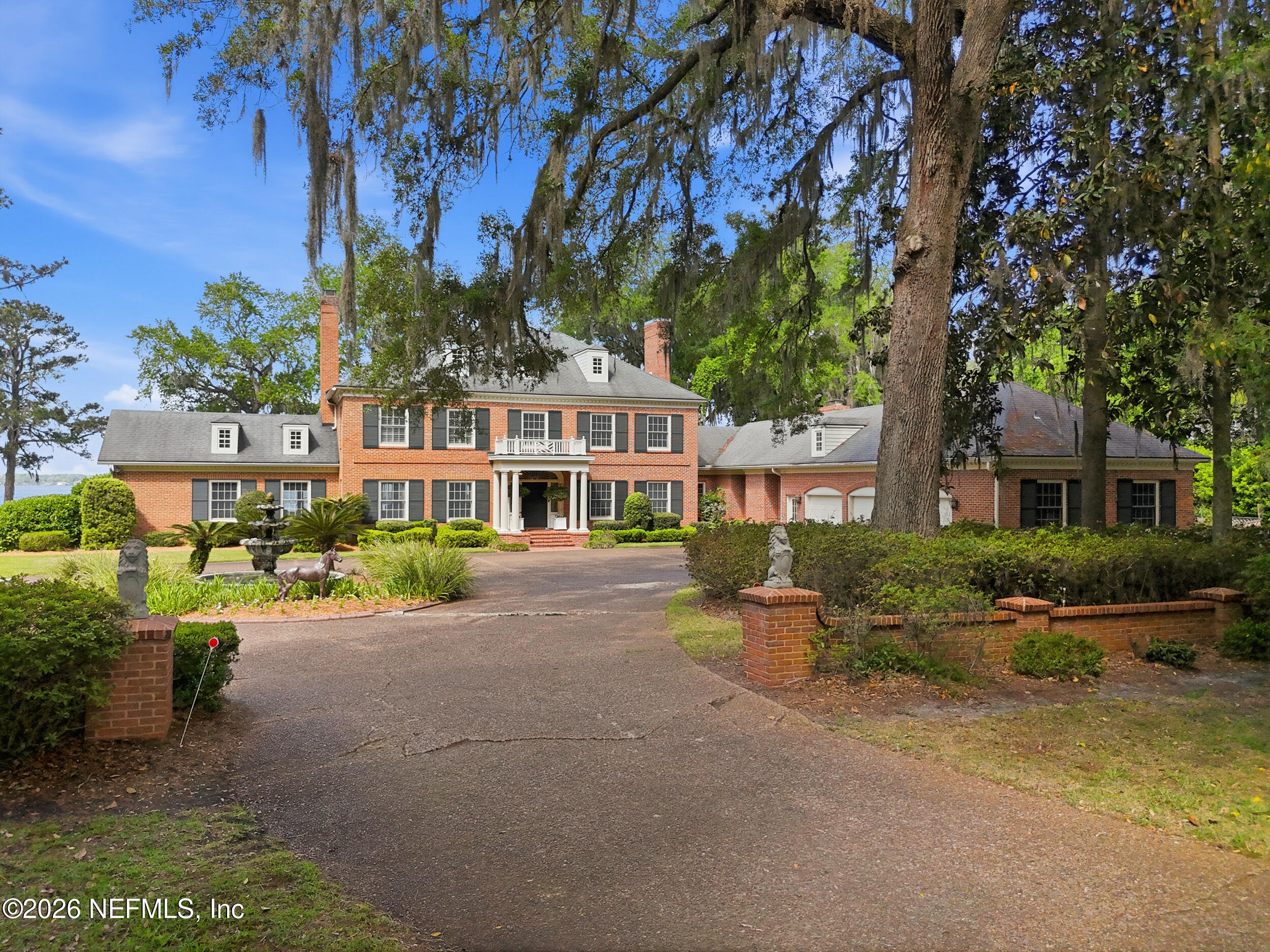 13200 Mandarin Road Jacksonville, FL 32223 - Photo 130 of 173 a front view of a house with a garden