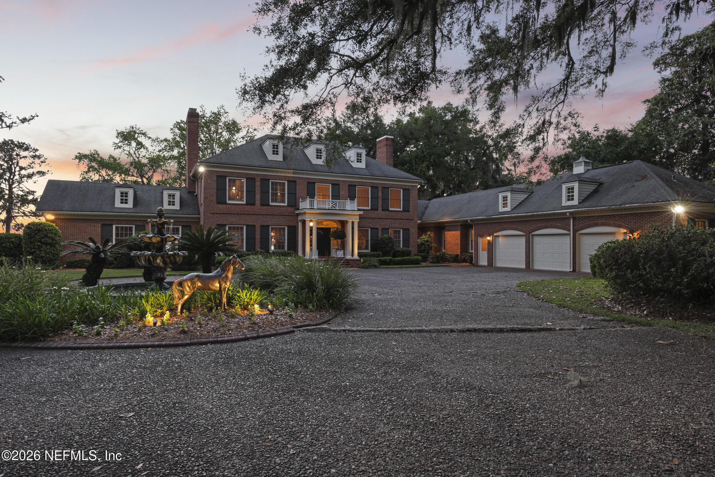13200 Mandarin Road Jacksonville, FL 32223 - Photo 144 of 173 a front view of a house with a yard and garage