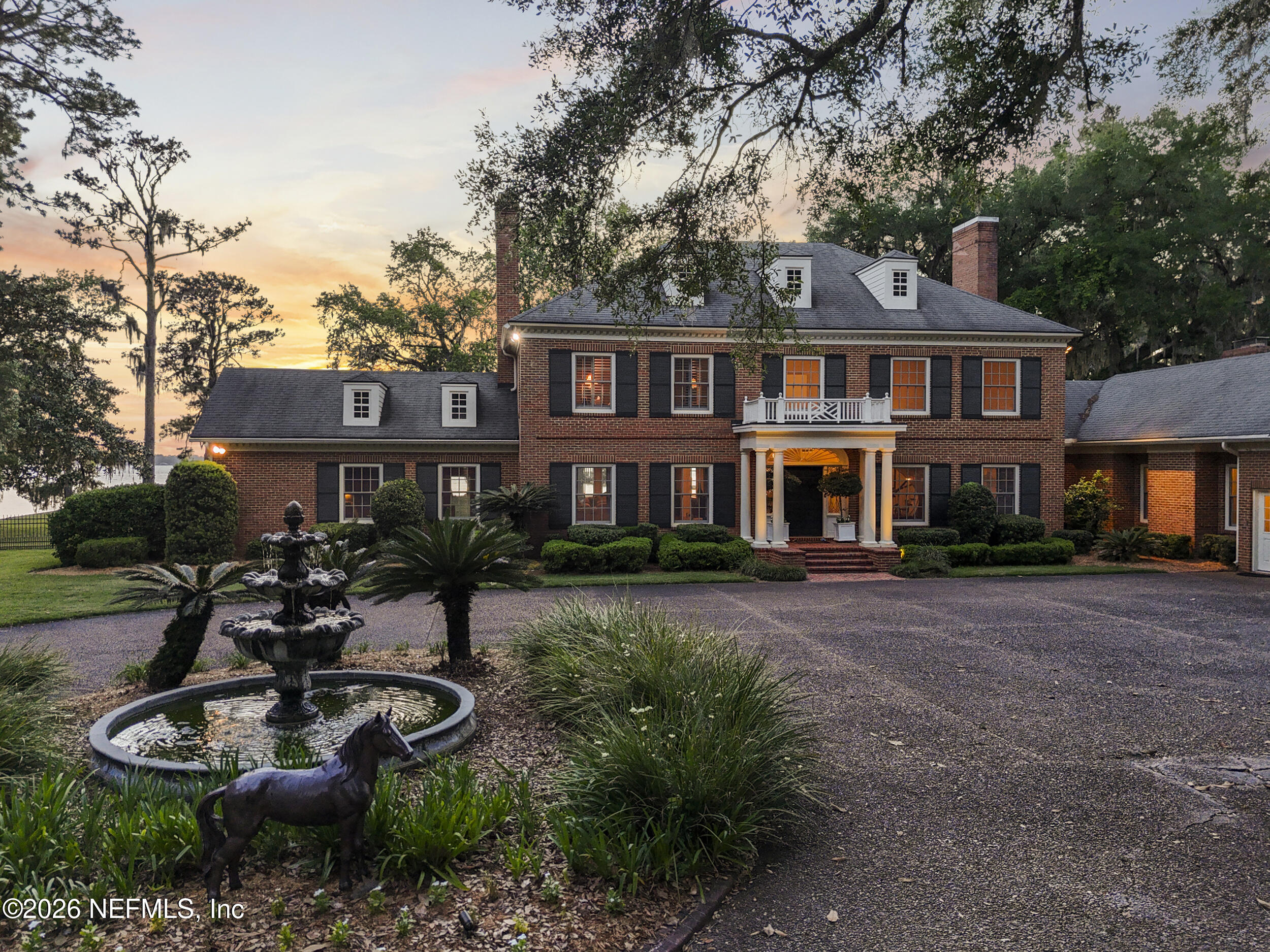 13200 Mandarin Road Jacksonville, FL 32223 - Photo 160 of 173 a front view of a house with yard patio and fire pit