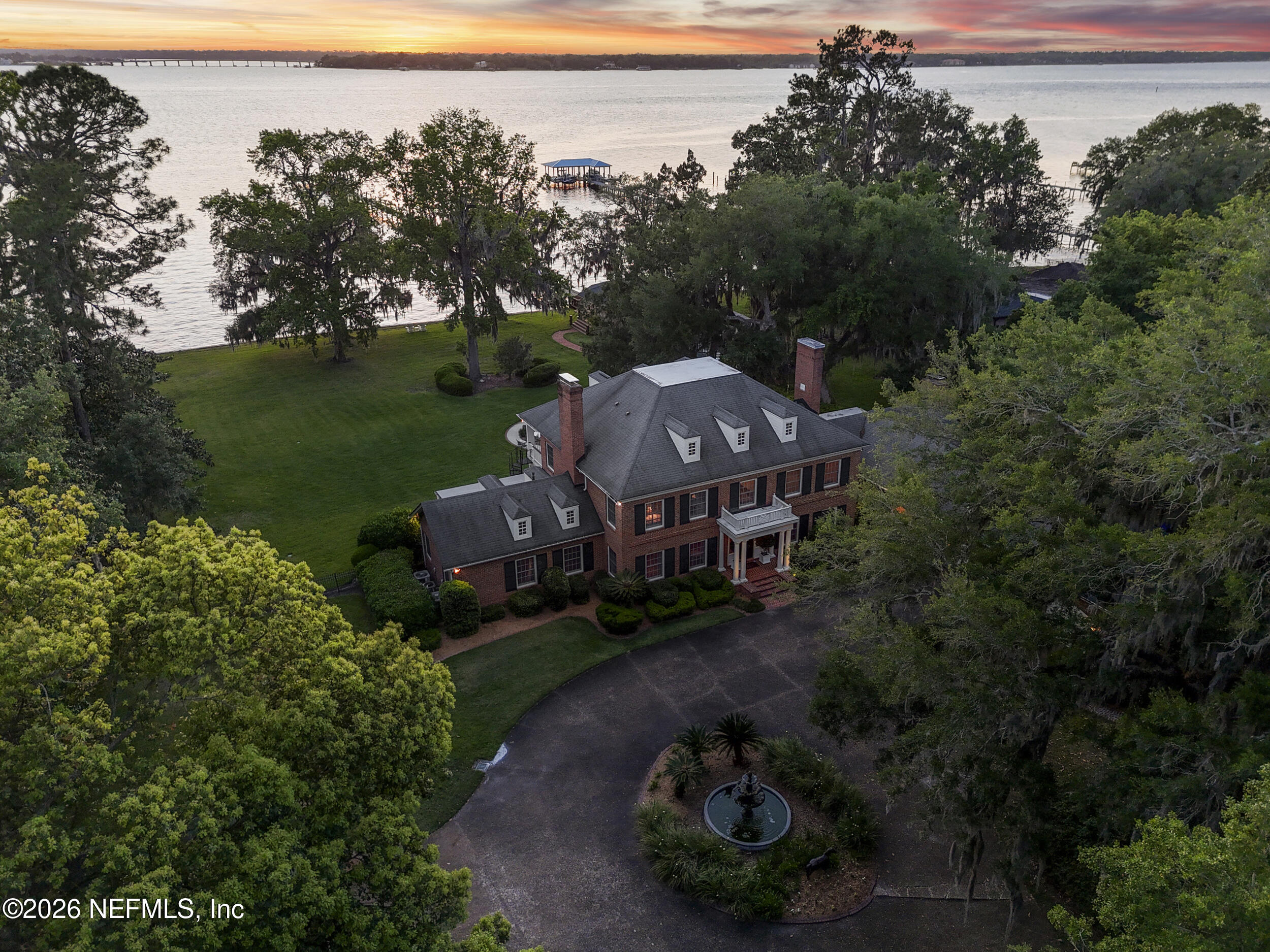 13200 Mandarin Road Jacksonville, FL 32223 - Photo 162 of 173 an aerial view of a house with garden space and lake view