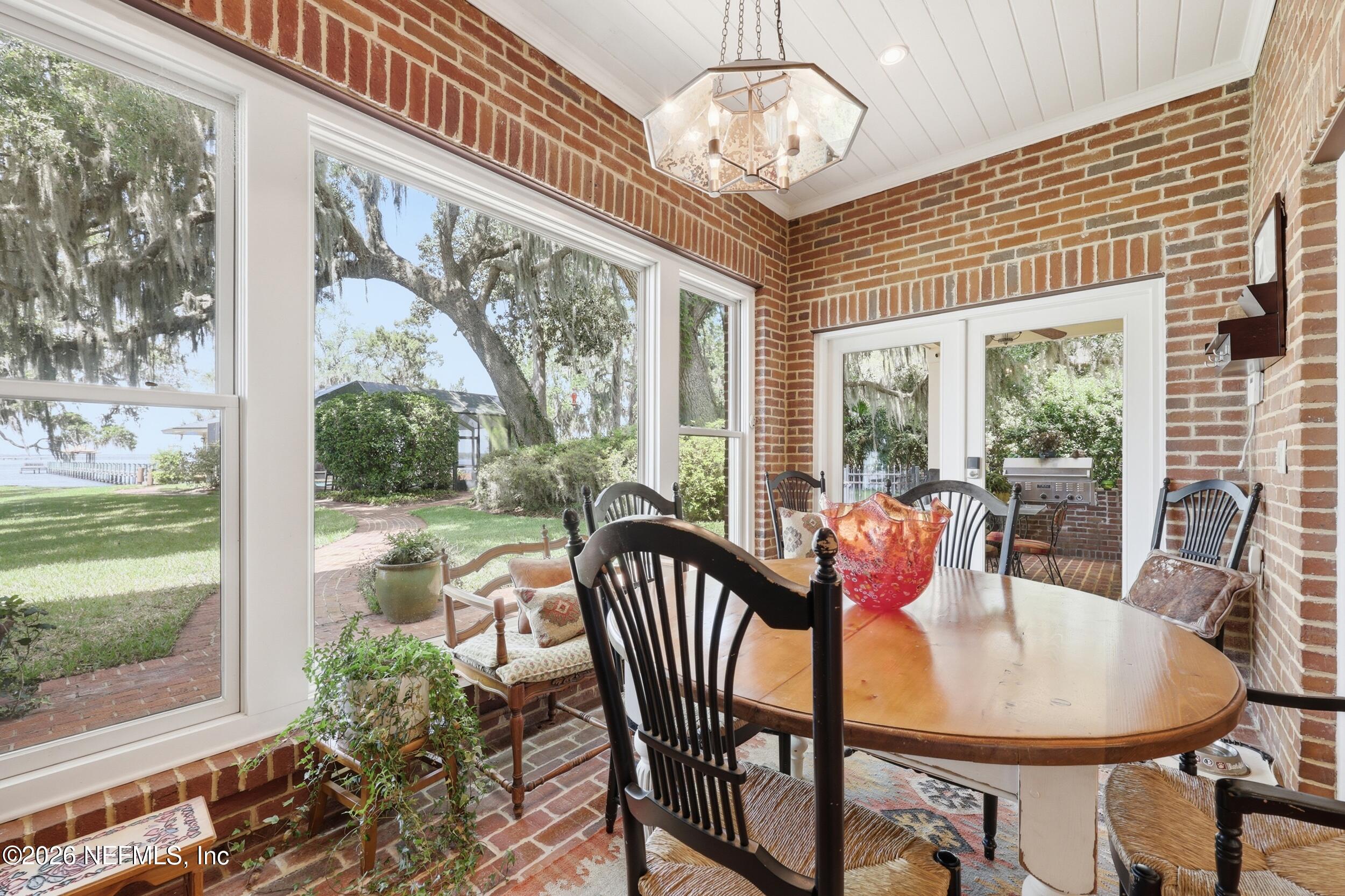 13200 Mandarin Road Jacksonville, FL 32223 - Photo 50 of 173 a view of a dining room with furniture window and outside view