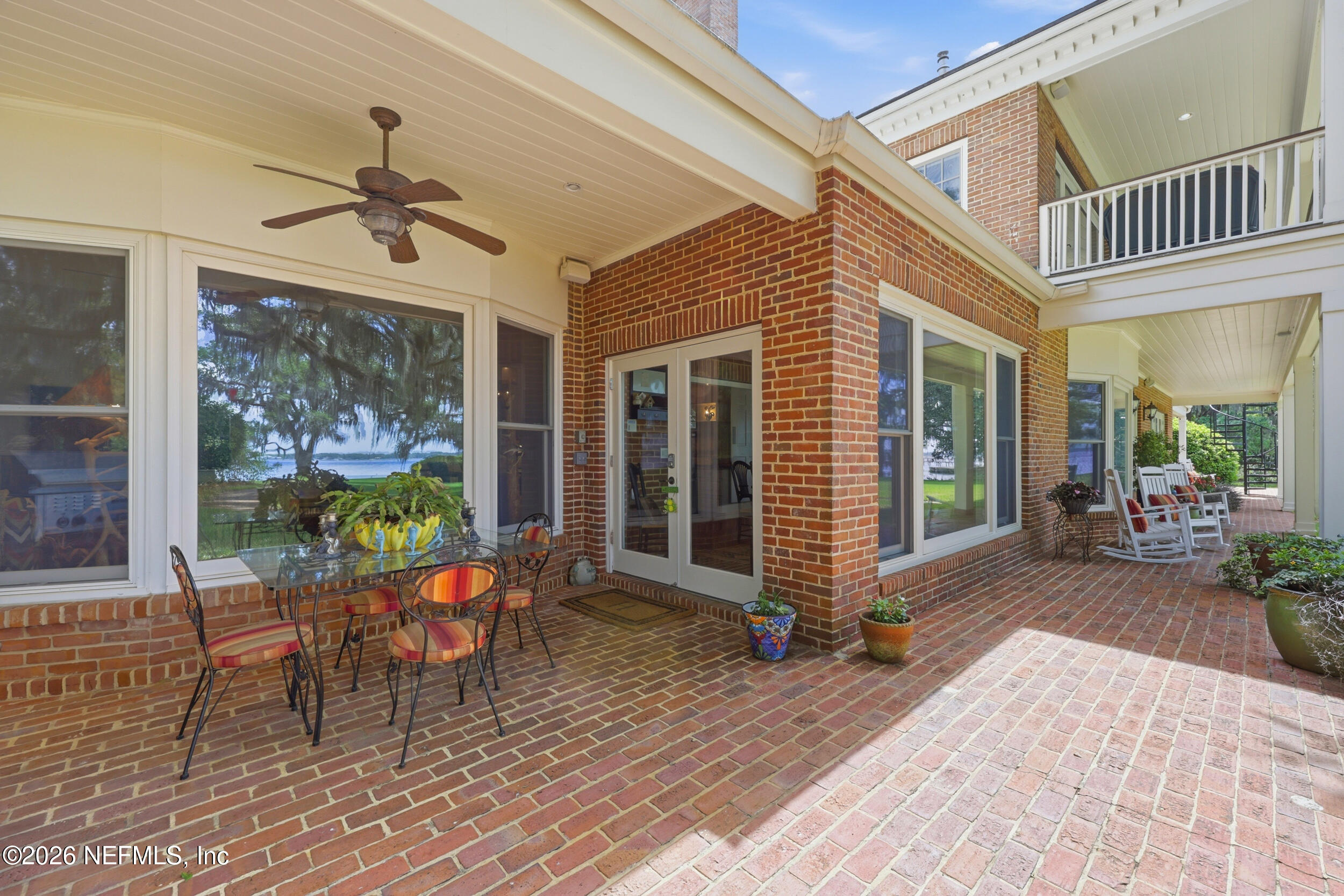 13200 Mandarin Road Jacksonville, FL 32223 - Photo 53 of 173 a view of a porch with furniture and floor to ceiling window