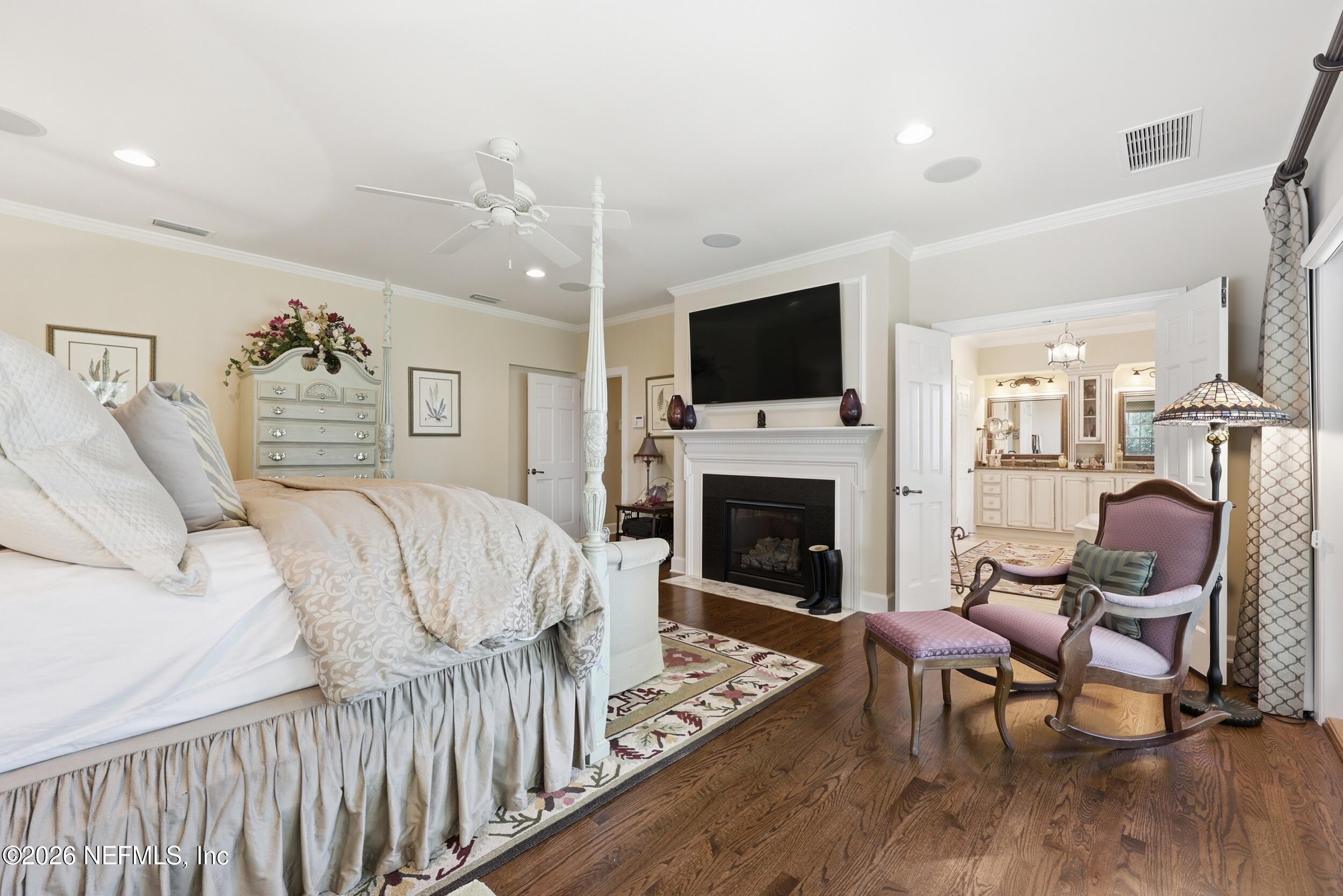 13200 Mandarin Road Jacksonville, FL 32223 - Photo 62 of 173 a living room with furniture fireplace and a flat screen tv