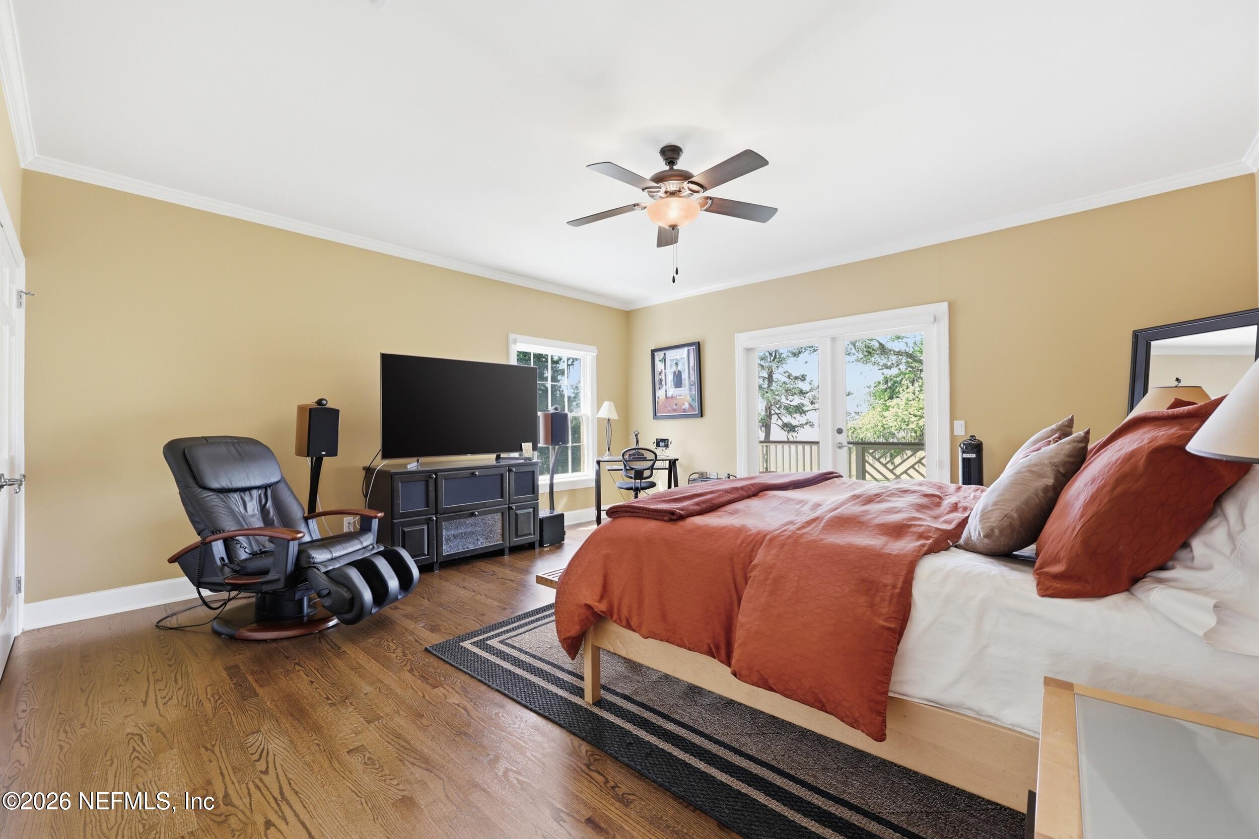 13200 Mandarin Road Jacksonville, FL 32223 - Photo 67 of 173 a bedroom with a bed and a flat screen tv
